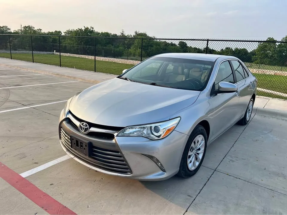 Silver Camry front quarter from the listing